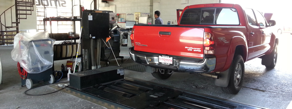 Red Car Serviced at California Smog Check