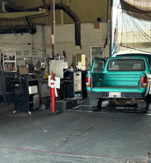 Silver Car Repaired by Techncian